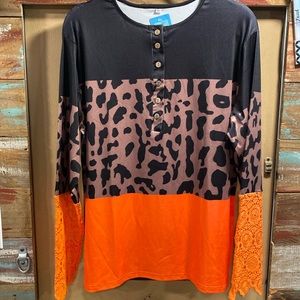 Orange, orange, animal, print, black top with lace halfway down long sleeve